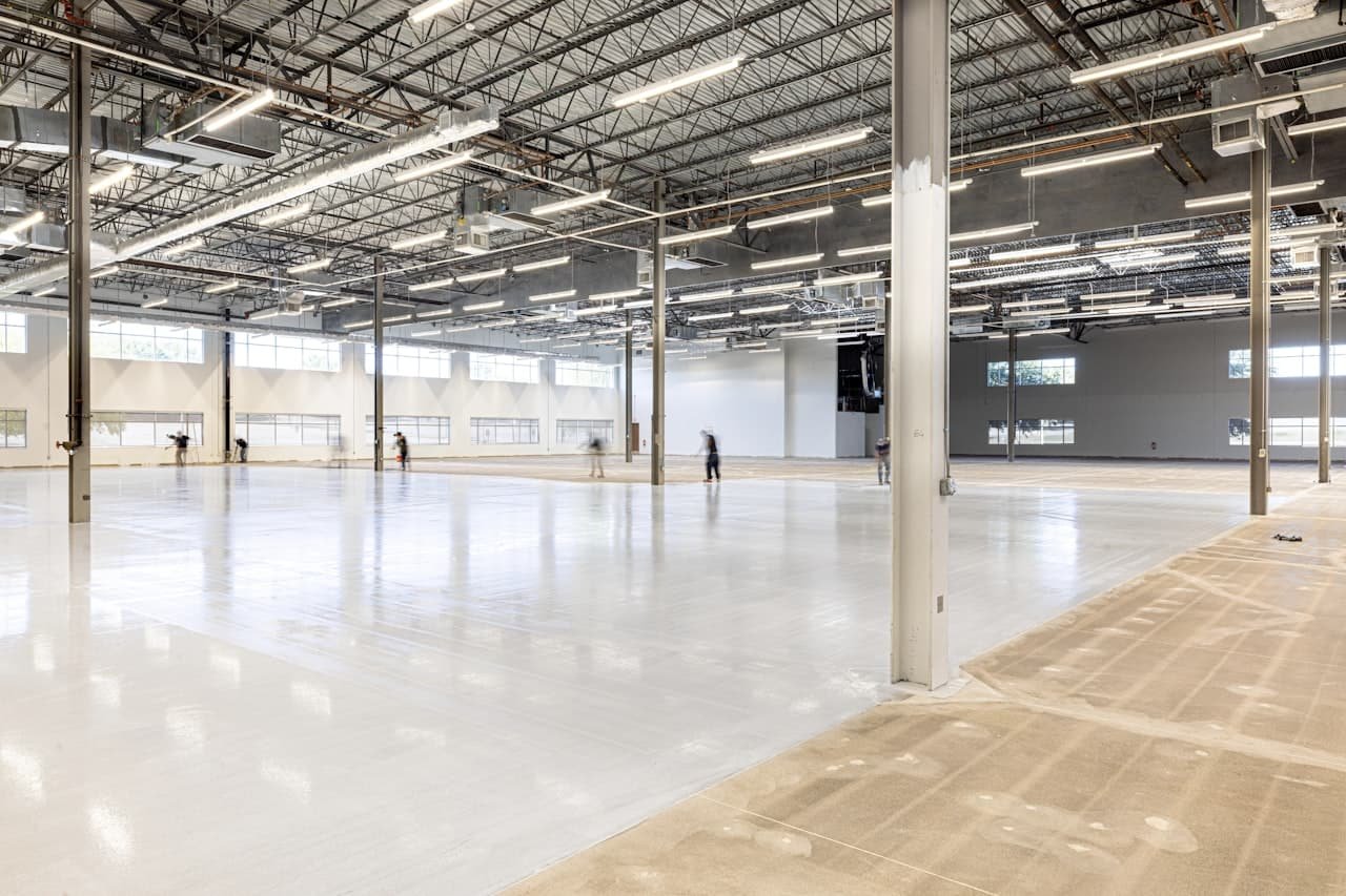 Polished and coated concrete floor in a large open space