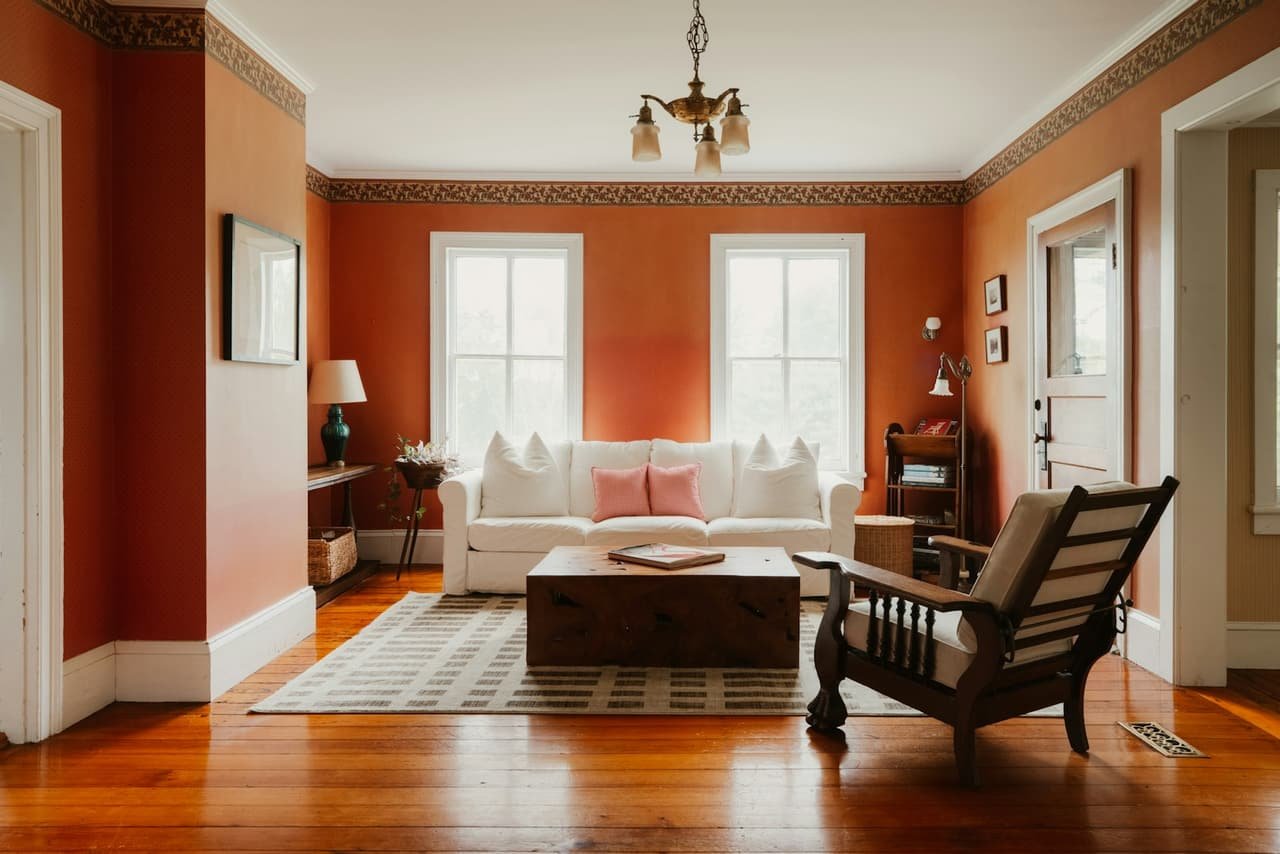 Freshly painted living room with warm terracotta walls