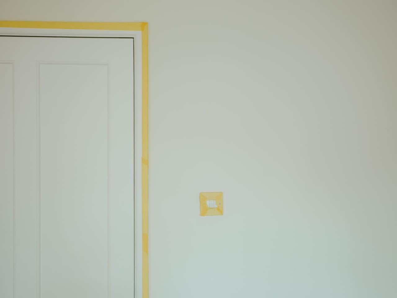 Door and wall edge masked before painting